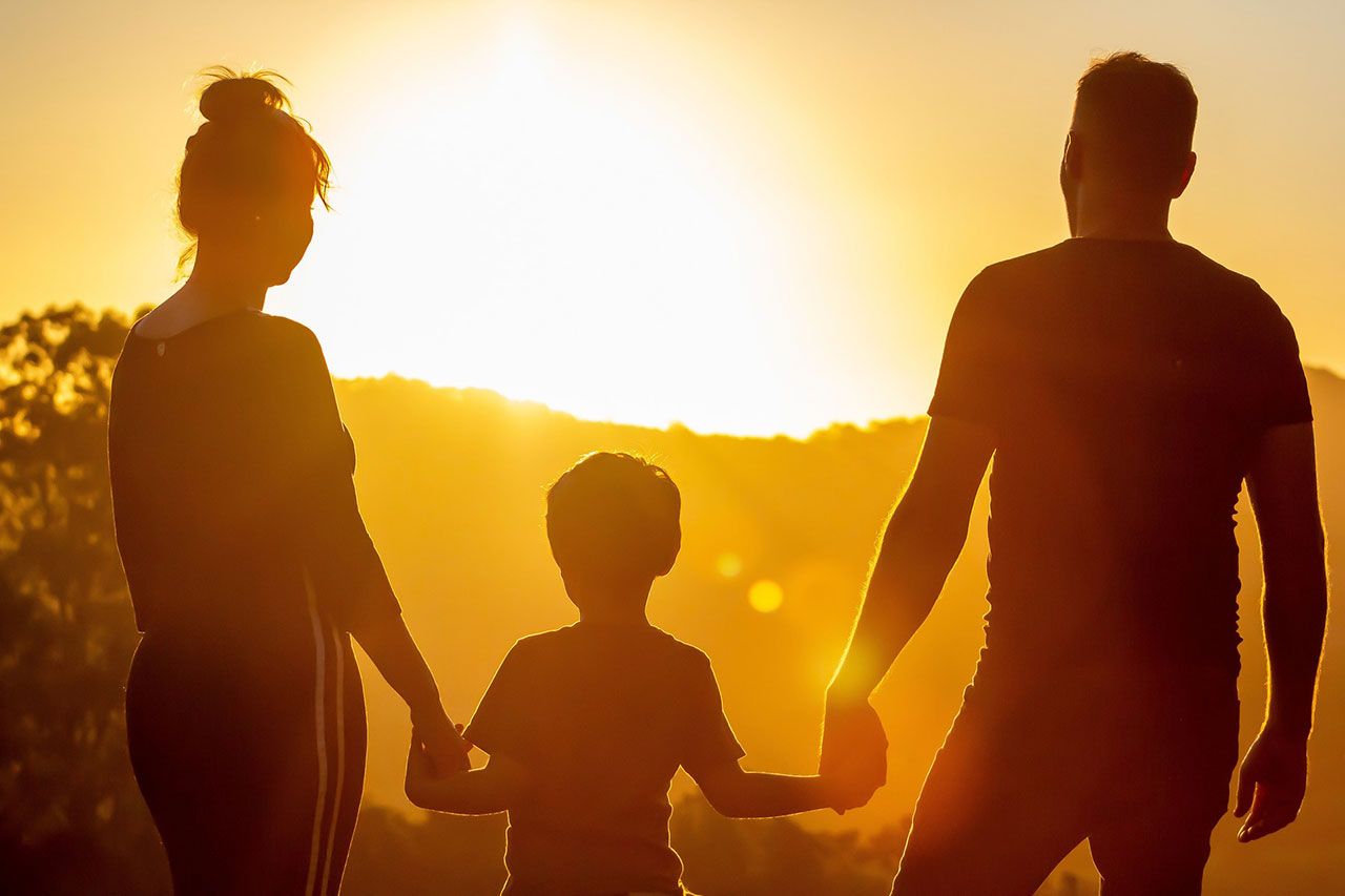 photo of a family walking